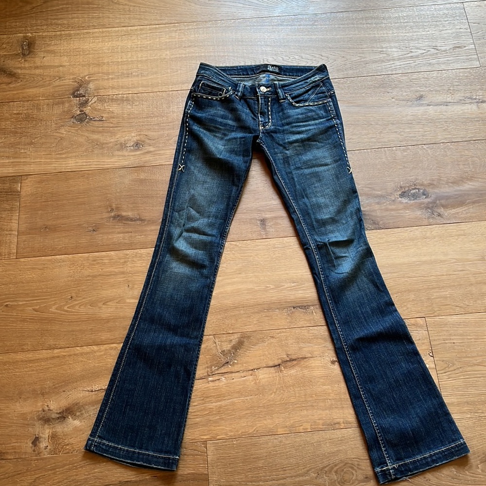 Low rise Boot-cut Antik Denim jeans